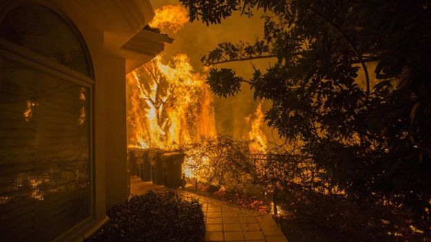 California wildfires: Nine dead and more than 150,000 evacuated