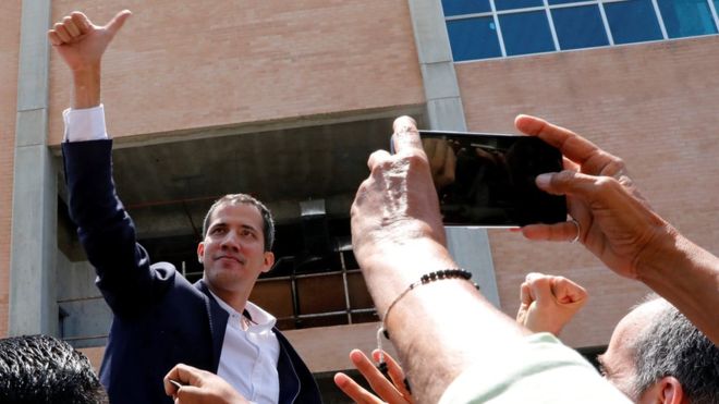 Juan Guaidó flies back to Venezuela despite arrest risk